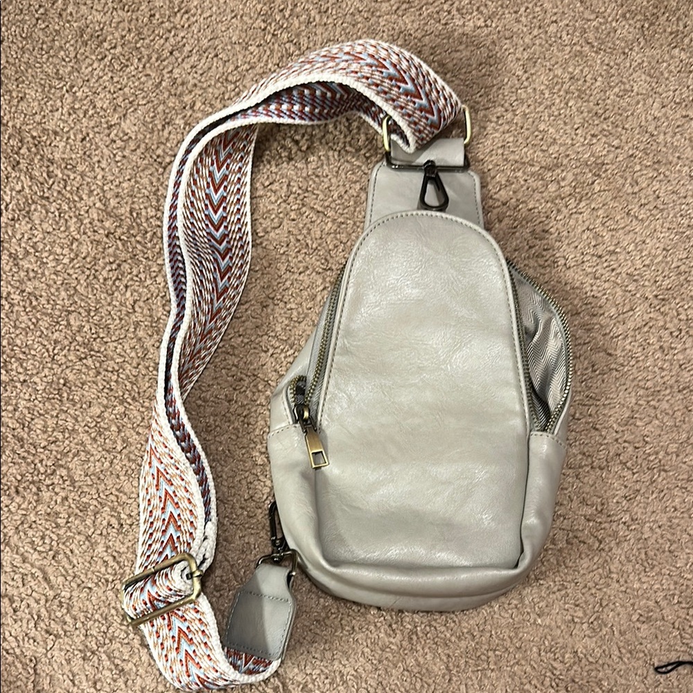 Stylish Gray Crossbody Bag with Patterned Strap